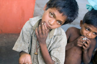 Borderless Captivity, Runaway boys, begging on station platform, Mumbai, India